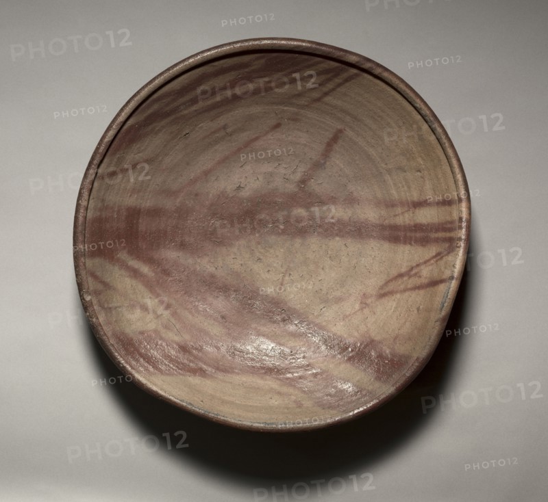 Plate: Bizen Ware, late 16th Century. Japan, Momoyama Period (1573-1615). Stoneware with natural glaze and hidasuki (fire-mark decoration) patterns; diameter: 45.4 cm (17 7/8 in.); overall: 10.4 cm (4 1/8 in.).