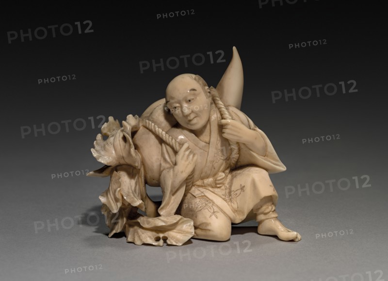 Man Carrying a Large Vegetable, Late 1800s- Early 1900s. Japan, Late 19th- Early 20th century. Ivory; overall: 6.7 cm (2 5/8 in.).