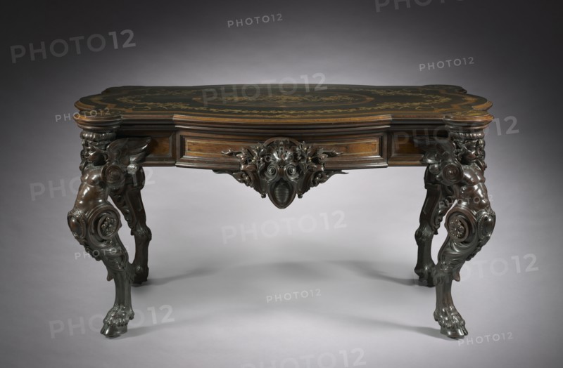 Center Table, c.1860. Gustave Herter Firm (American). Rosewood with marquetry of various woods, brass inlay and gilding; overall: 74.9 x 143.2 x 90.8 cm (29 1/2 x 56 3/8 x 35 3/4 in.).