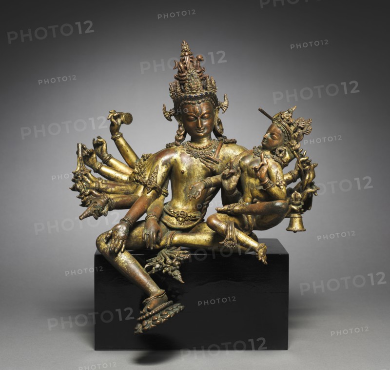 Uma-Maheshvara, 1300s. Nepal, 14th century. Gilt bronze; overall: 29.8 x 27.2 cm (11 3/4 x 10 11/16 in.); with base: 32.6 cm (12 13/16 in.).
