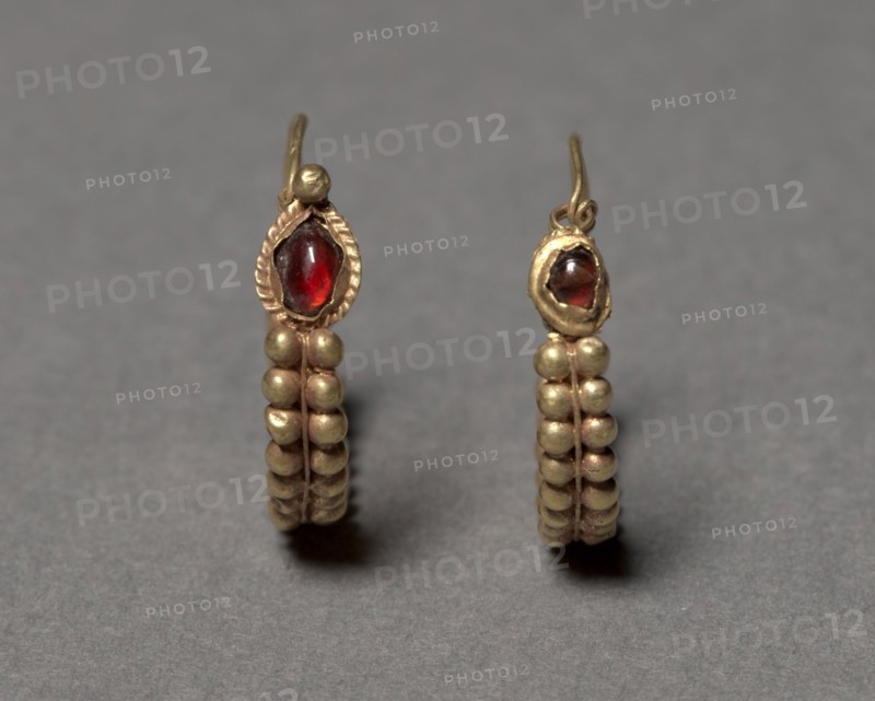 Earrings, 100 BC-100. Syria, Roman, 1st Century BC-1st Century. Gold and garnet; diameter: 2.4 cm (15/16 in.); overall: 0.5 cm (3/16 in.).