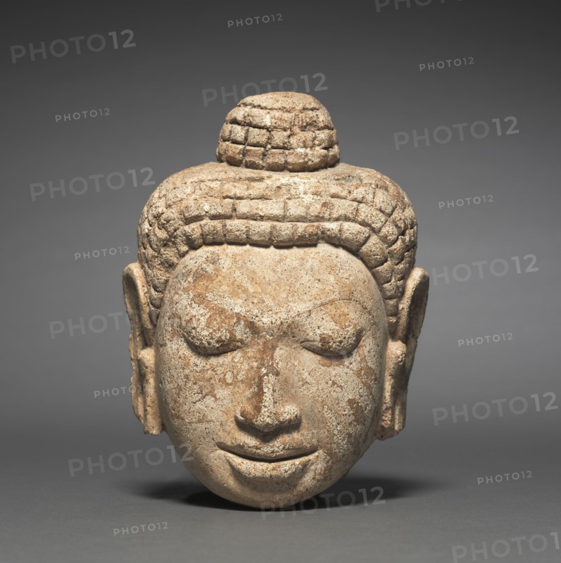 Head of Buddha, c. 7th Century. Thailand, Mon-Dvaravati period. Stucco; overall: 15.7 x 11.7 cm (6 3/16 x 4 5/8 in.).