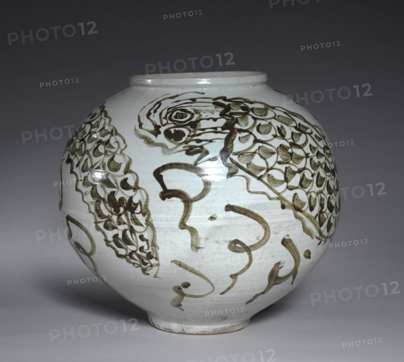 Jar with Dragon and Clouds Design, late 1600s. Korea, Joseon dynasty (1392-1910). Porcelain with underglaze iron; diameter of base: 13.7 cm (5 3/8 in.); overall: 34.7 cm (13 11/16 in.).