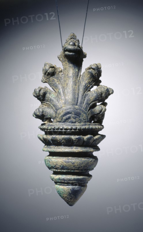 Earring, c. 12th-13th Century. Cambodia, Angkorean Period (877-1431). Bronze; overall: 8.3 x 3.5 x 3.2 cm (3 1/4 x 1 3/8 x 1 1/4 in.).