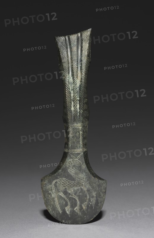 Axe Head, 900-600 BC. Russia or Turkey, North-Central Caucasus, Kuban culture, 9th-7th Century BC. Bronze, cast in bi-part mold, polished, incised, and chased; overall: 3 cm (1 3/16 in.).