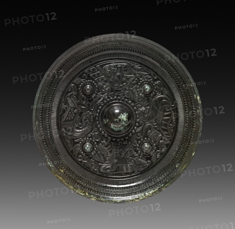 Mirror with Four Nipples, Immortals, Dragon and Tiger, c. 125-220. China, probably Zhejiang province, Eastern Han dynasty (25-220). Bronze; diameter: 20.9 cm (8 1/4 in.).