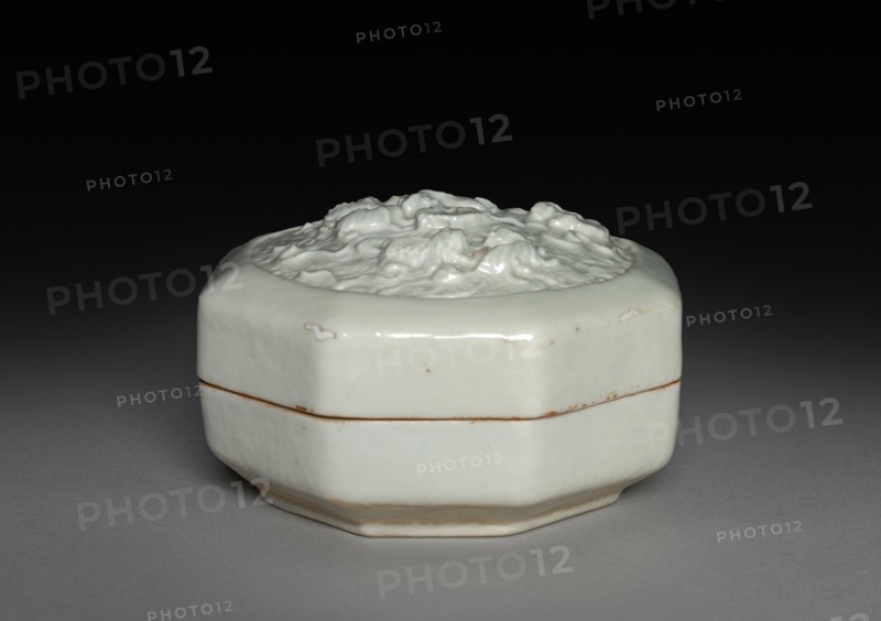 Hexagonal Covered Box with Lions in Relief: Qingbai Ware, 1300-1325. China, Jiangxi province, Jingdezhen kilns, Yuan dynasty (1271-1368). Glazed porcelain with molded and applied decoration; overall: 6.1 x 9.8 cm (2 3/8 x 3 7/8 in.).