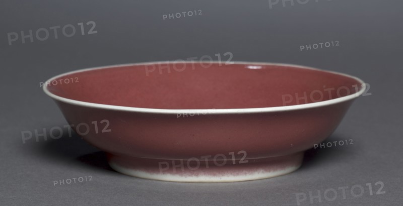 Dish, 1426-1435. China, Jiangxi province, Jingdezhen, Ming dynasty (1368-1644), Xuande mark and period (1426-1435). Porcelain with copper-red glaze; diameter: 15 cm (5 7/8 in.); overall: 3.9 cm (1 9/16 in.).