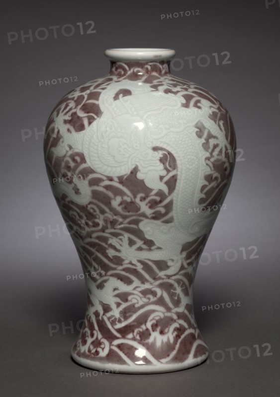 Meiping (Prunus) Vase with Dragons in Waves, 1723-1735. China, Jiangxi province, Jingdezhen kilns, Qing dynasty (1644-1912), Yongzheng mark and reign (1722-1735). Porcelain with incised and underglaze red decoration; diameter: 17.3 cm (6 13/16 in.); overall: 28.5 cm (11 1/4 in.).