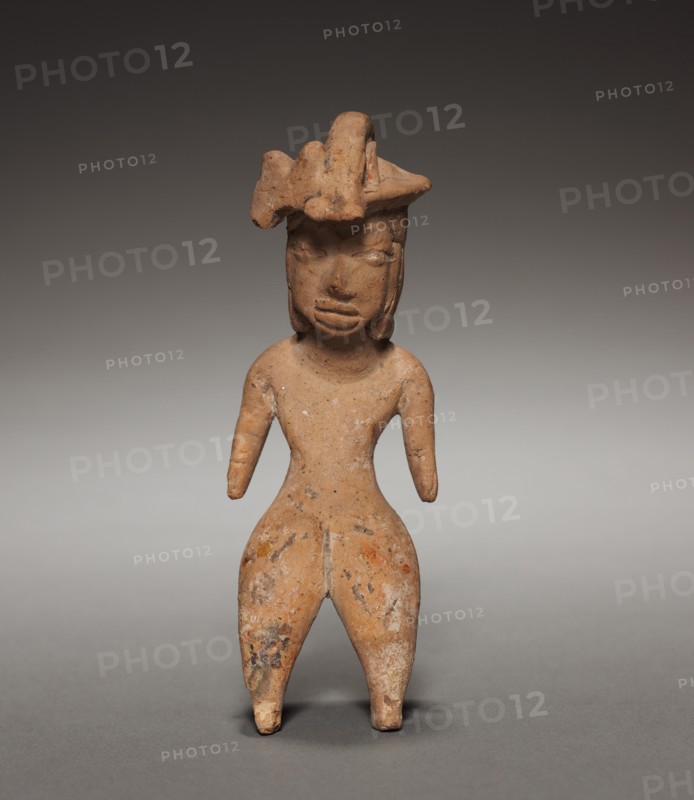 Female Figurine with Headdress, 1200-900 BC. Mexico, Tlatilco, type D1. Pottery with traces of white and red pigment; overall: 11.2 x 3.7 x 4.2 cm (4 7/16 x 1 7/16 x 1 5/8 in.).