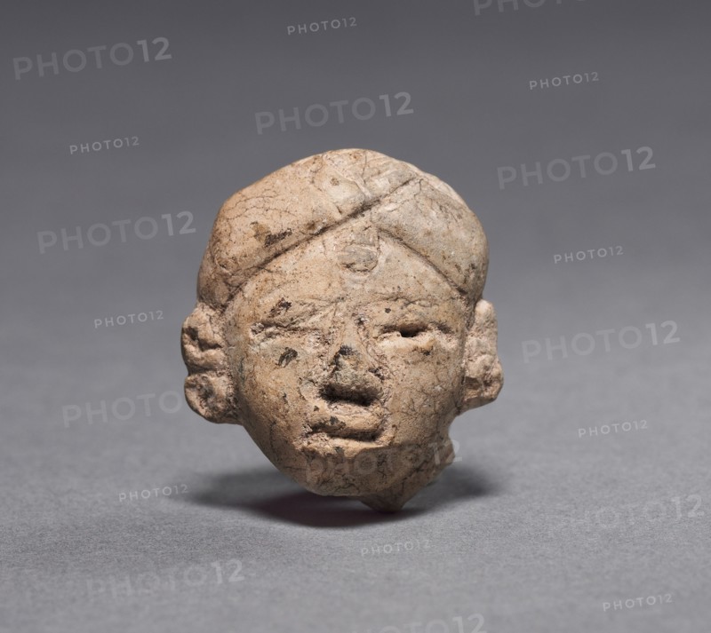 Figurine Head, c. 600-200 BC. Mexico or Central America, Maya(?), Middle Preclassic period. Pottery; overall: 3.1 x 2.6 x 1.9 cm (1 1/4 x 1 x 3/4 in.).