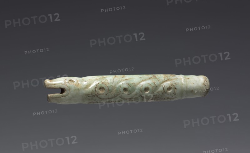 Serpent-form Fan Handle(?), 900-1519. Central Mexico, Mixtec. Pale green jade; diameter: 1.9 cm (3/4 in.); overall: 10.5 x 2 cm (4 1/8 x 13/16 in.).
