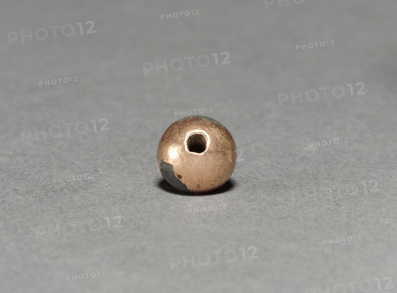 Bead, 1200-1519. Mexico, Oaxaca, Mixtec. Clay covered with gold; diameter: 1 cm (3/8 in.).
