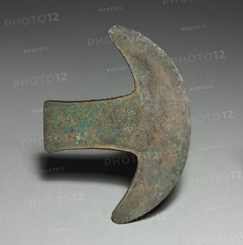Axe-shaped Implement, 1200-1519. Mexico, Oaxaca, Mixtec. Cast and hammered copper; overall: 11 x 15 x 0.4 cm (4 5/16 x 5 7/8 x 3/16 in.).
