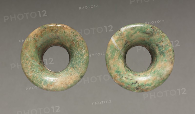 Pair of Ear Ornaments, 150-200. Central Mexico, Teotihuacán style, Classic Period. Jadeite-albitite(?); diameter: 5.6 cm (2 3/16 in.); overall: 2.4 cm (15/16 in.).