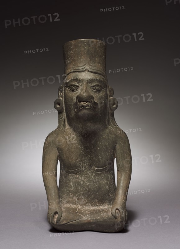Urn Figure, c. 150 BC-AD 200. Mexico, Oaxaca, Zapotec. Earthenware; overall: 29.8 x 14.4 x 13 cm (11 3/4 x 5 11/16 x 5 1/8 in.).