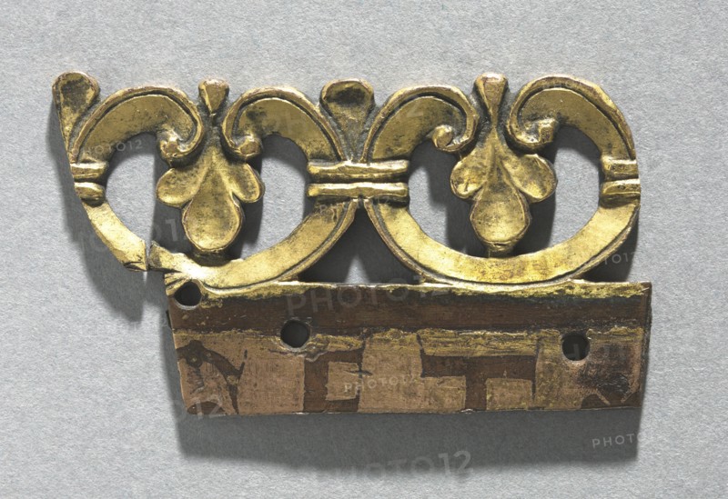Fragment of an Ornamental Crest from a Reliquary Shrine, c. 1165-1180. Mosan, Meuse Valley, Maastricht?, Gothic period, 12th century. Gilded copper, émail brun (brown enamel); overall: 5.5 x 3.1 cm (2 3/16 x 1 1/4 in.)