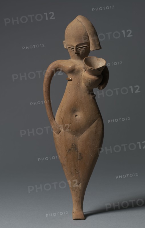 Statuette of a Serving Girl, c. 1323-1186 BC. Egypt, New Kingdom, late Dynasty 18 (1540-1296 BC) to Dynasty 19 (1295-1186 BC). Terracotta, originally painted; overall: 38.4 x 9.2 cm (15 1/8 x 3 5/8 in.).