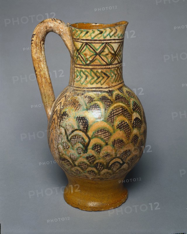 Jug with Scale Pattern, c. 1350. Italy, Siena, 14th century. Tin-glazed earthenware (maiolica); overall: 26.9 x 10 cm (10 9/16 x 3 15/16 in.).