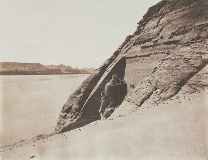 Égypte et Nubie, sites et monuments les plus intéressants pour l'étude de l'art et de l'histoire, deuxième partie pl.153: Large Speos - View taken from the Sand Slope (Temple of Ramesses II), Abu Simbel, 1851-1852. Félix Teynard (French, 1817-1892), Goupil et Cie. Salted paper print from calotype negative; image: 23.9 x 30.8 cm (9 7/16 x 12 1/8 in.); paper: 37.8 x 50.3 cm (14 7/8 x 19 13/16 in.); matted: 50.8 x 61 cm (20 x 24 in.)