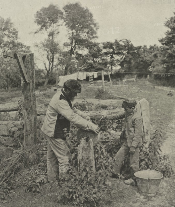 Pictures of East Anglian Life, pl. XXX: At the Grindstone--A Suffolk Farmyard, 1888. Peter Henry Emerson (British, 1856-1936), Sampson Low, Marston, Searle and Rivington. Photogravure; image: 26.7 x 22.7 cm (10 1/2 x 8 15/16 in.); paper: 42.5 x 33.6 cm (16 3/4 x 13 1/4 in.); matted: 50.8 x 40.6 cm (20 x 16 in.).