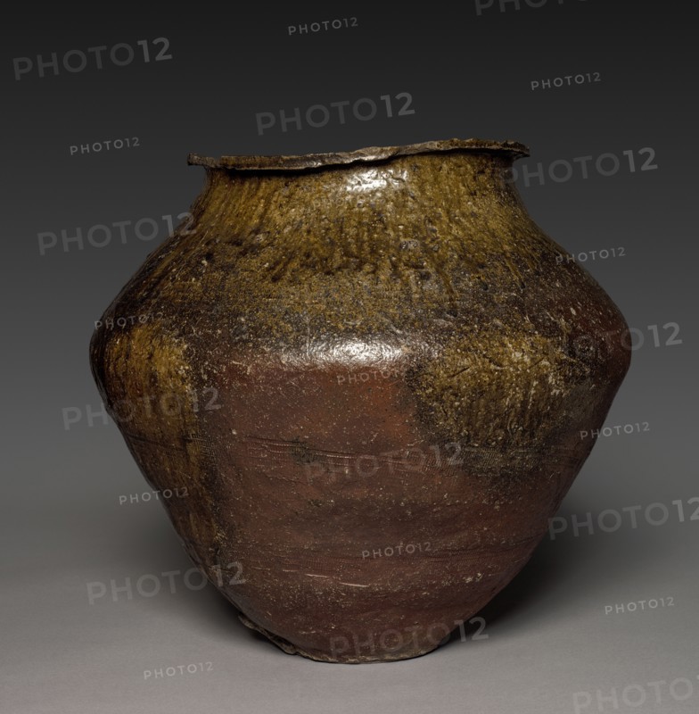 Storage Jar, 1350-99. Japan, Nanbokucho period (1336-92). Stoneware with natural ash glaze and impressed designs (Tokoname ware); diameter: 55.3 cm (21 3/4 in.); overall: 51 cm (20 1/16 in.).
