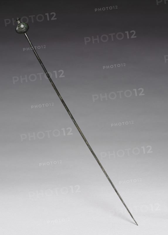 Garment Pin, c. 1400 BC. Possibly Hungary, Bronze Age, c. 2500-800 BC. Cast and wrought bronze; overall: 35.9 x 2.3 cm (14 1/8 x 7/8 in.).