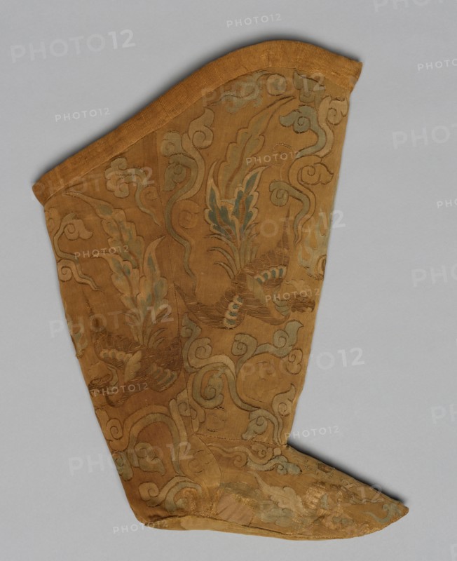 Boot, 907-1125. Northern China, Liao dynasty (907-1125). Silk: tapestry weave; two kinds of metal threads; overall: 47.5 x 30.8 cm (18 11/16 x 12 1/8 in.)