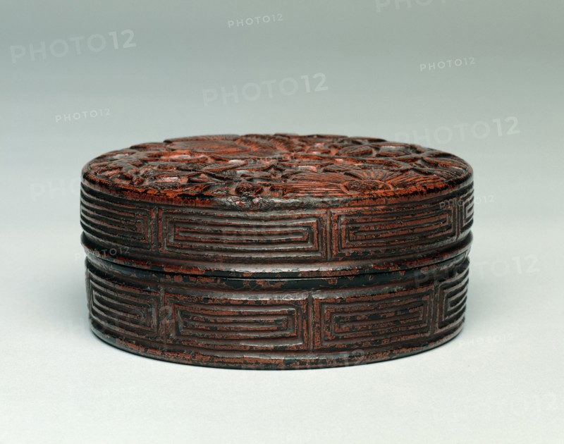 Incense Box (Kogo) with Camellia Design, 1500s. Japan, Muromachi Period (1392-1573). Carved wood with black and red lacquer; diameter: 14.9 cm (5 7/8 in.); overall: 6.4 cm (2 1/2 in.).