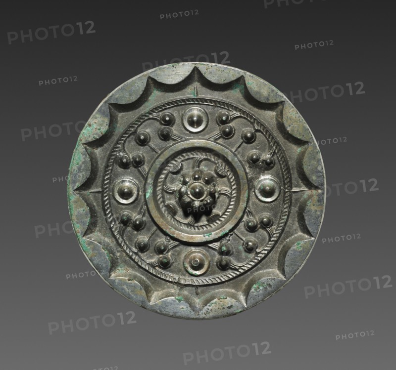 Mirror with Clouds and Nebulae, 200-100 BC. China, Western Han dynasty (202 BC-AD 9). Bronze; diameter: 10 cm (3 15/16 in.); overall: 1.2 cm (1/2 in.); rim: 0.4 cm (3/16 in.).