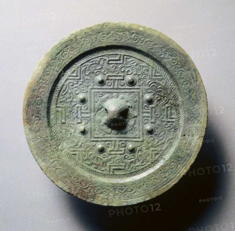 TLV Mirror with Eight Nipples, 4th-5th Century. Japan, 4th-5th Century. Bronze; diameter: 12.3 cm (4 13/16 in.); overall: 0.8 cm (5/16 in.); rim: 0.4 cm (3/16 in.).