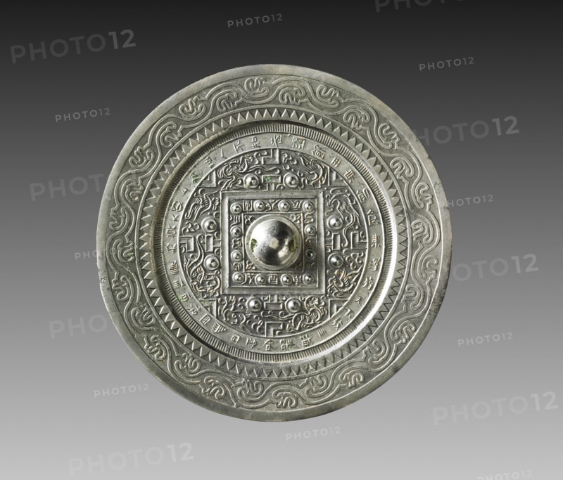 TLV Mirror with Multiple Nipples, 9-23. China, Xin dynasty (9-23). Bronze; diameter: 16.9 cm (6 5/8 in.); overall: 1.1 cm (7/16 in.); rim: 0.5 cm (3/16 in.).