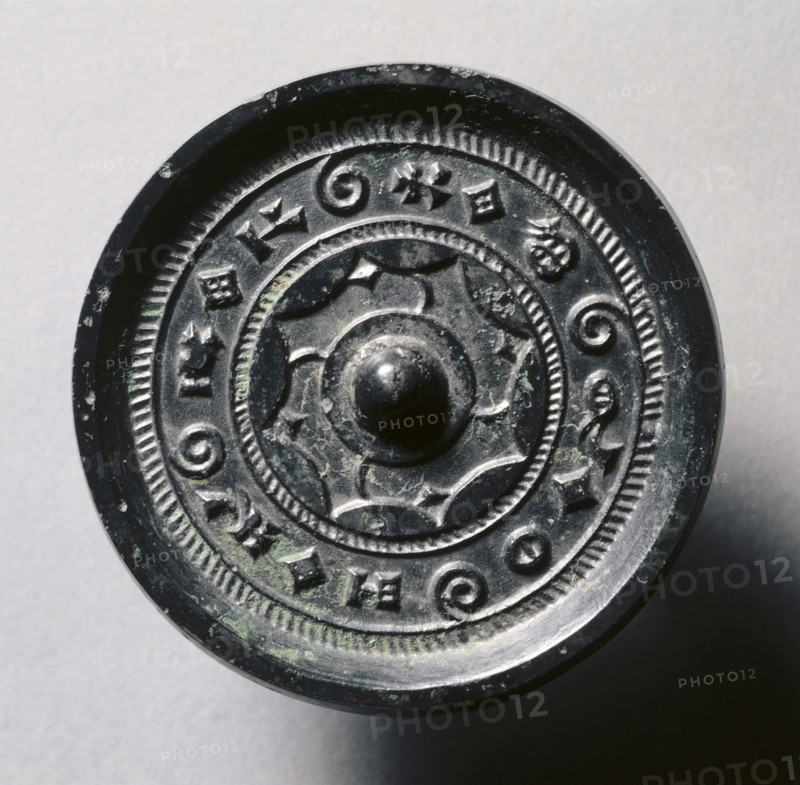 Mirror with Concentric Circles and Linked Arcs