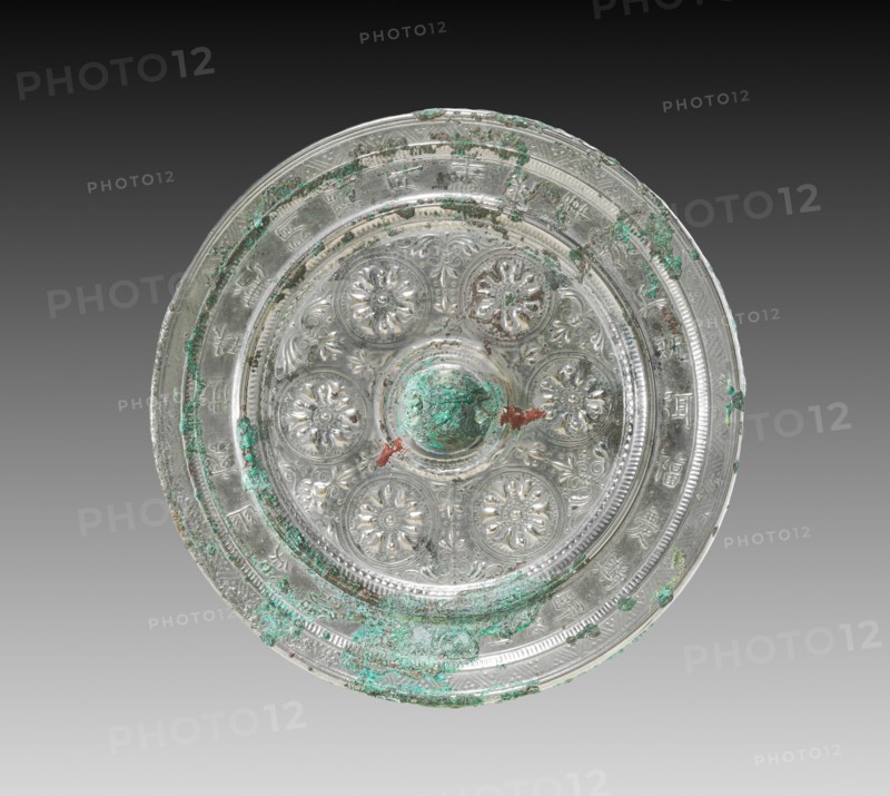 Mirror with Six Circular Flowers, 600s. China, Tang dynasty (618-907). Bronze; diameter: 16.6 cm (6 9/16 in.); overall: 1.5 cm (9/16 in.); rim: 0.9 cm (3/8 in.).