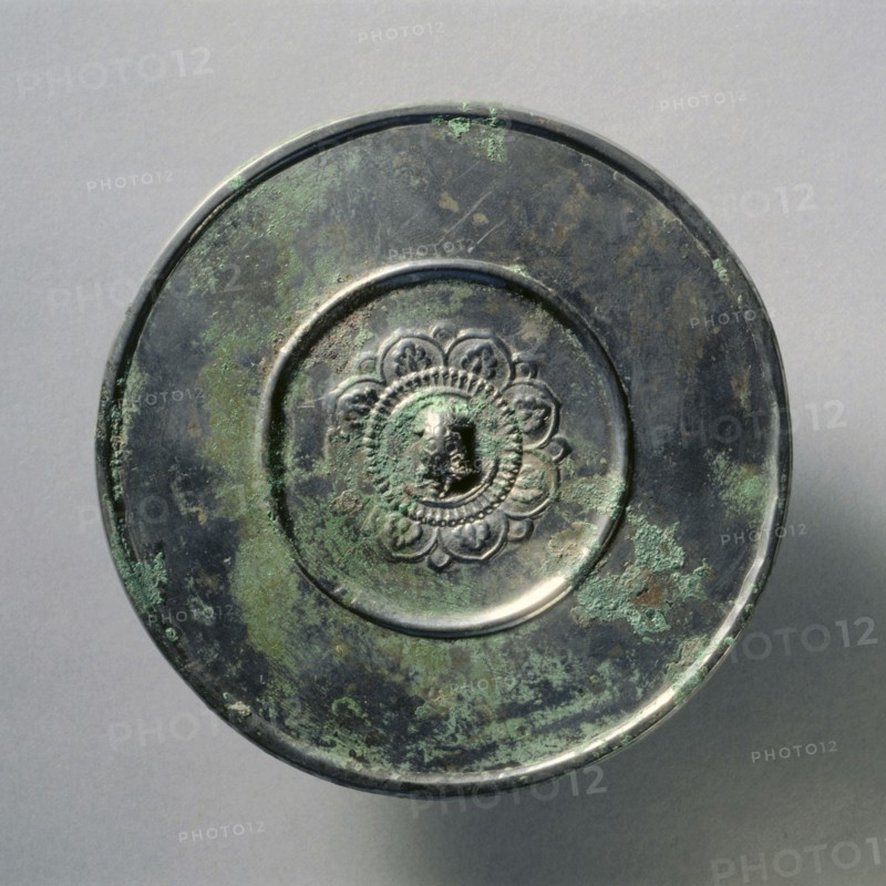 Mirror of Tortoise Knob and Lotus Pattern, early 7th Century - early 10th Century. China, Tang dynasty (618-907). Bronze; diameter: 12.5 cm (4 15/16 in.); overall: 0.7 cm (1/4 in.); rim: 0.5 cm (3/16 in.).
