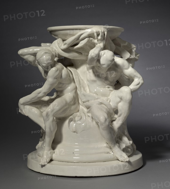 Titans, Support for a Vase, c. 1877. Auguste Rodin (French, 1840-1917), probably by Albert-Ernest Carrier-Belleuse (French, 1824-1887). Glazed earthenware; overall: 37.5 x 38.1 x 38.1 cm (14 3/4 x 15 x 15 in.).