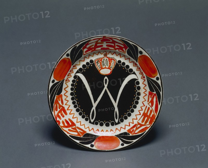 Plate, 1898. Carel-Adolphe-Lion Cachet (Netherlandish, 1864-1945), Petrus Regout & Co., Maastricht (Netherlandish). Earthenware; diameter: 20.4 cm (8 1/16 in.); overall: 2.7 cm (1 1/16 in.).