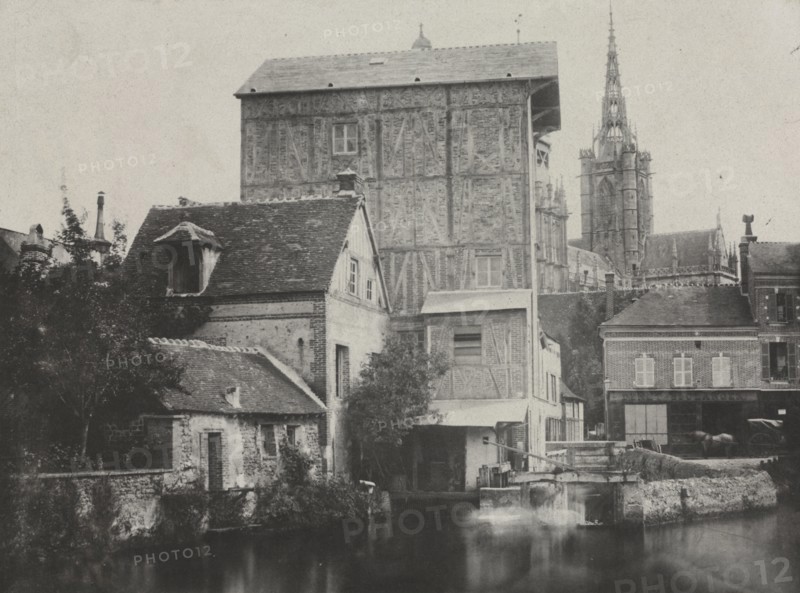 Souvenirs photographiques, pl. 15 (book): View of Évreux, 1850. Hippolyte Bayard (French, 1801-1887). Salted paper print from waxed paper negative, Blanquart-Évrard process; image: 18.9 x 25.7 cm (7 7/16 x 10 1/8 in.); matted: 50.8 x 61 cm (20 x 24 in.)