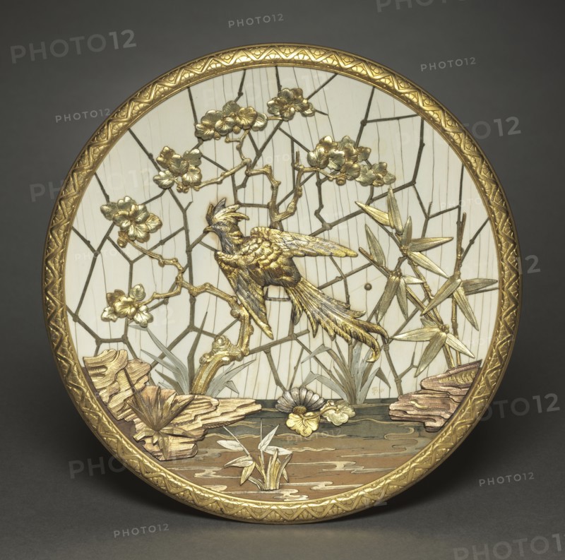 Plaque, c. 1880. Veuve Ferdinand Duvinage (French), Alphonse Giroux (French). Metal gilded in several colors of gold, silver-colored metal, ivory, wood; diameter: 26.9 cm (10 9/16 in.).