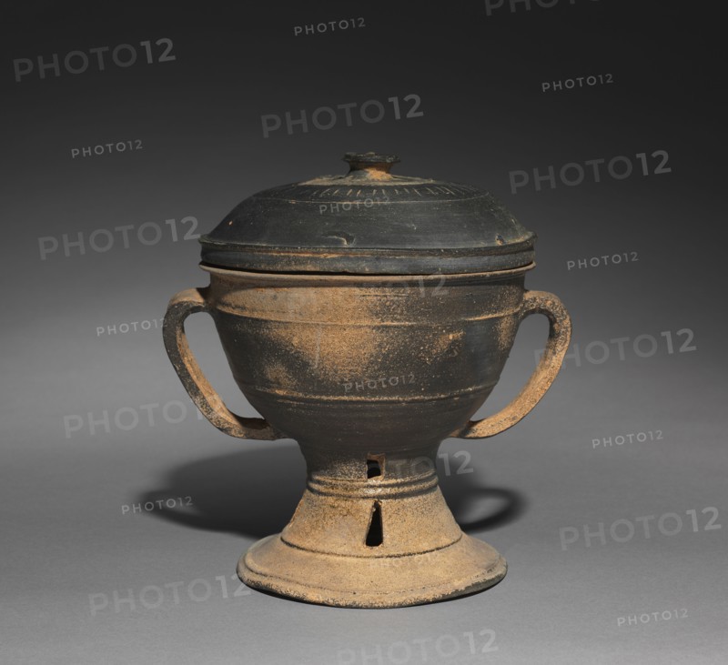 Lidded Cup with Strap Handles, 300s-400s. Korea, Kaya Period (42-562). Stoneware with natural ash glaze; overall: 21.1 cm (8 5/16 in.); outer diameter: 15.7 cm (6 3/16 in.).