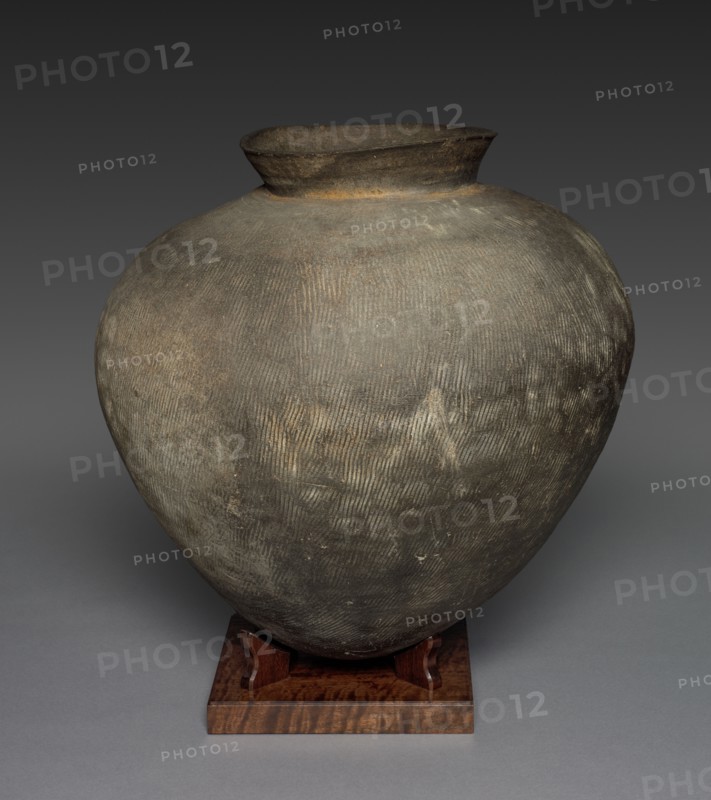 Storage Jar: Sueki ware, 700s. Japan, Nara period (710-794). Stoneware with incised and impressed decoration and natural ash glaze; diameter of mouth: 23.8 cm (9 3/8 in.); overall: 49.2 x 50 cm (19 3/8 x 19 11/16 in.).