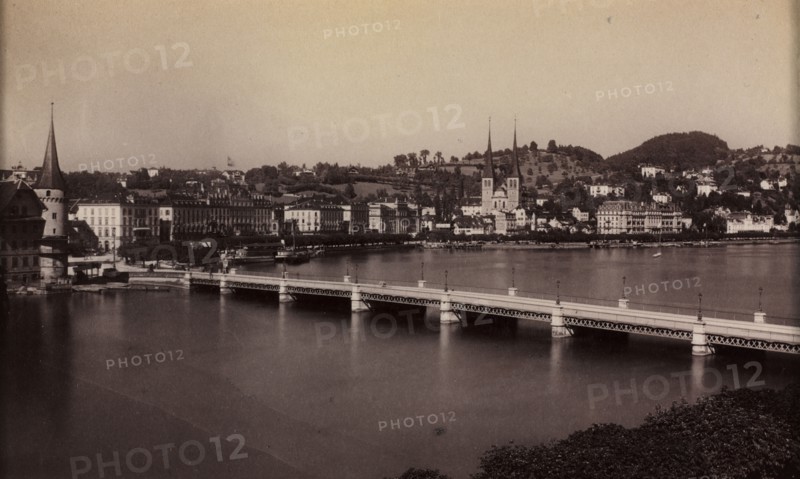 Untitled (Bridge with Town in Distance), 19th century. Unidentified Photographer. Albumen print from wet collodion negative; paper: 9.6 x 15.5 cm (3 3/4 x 6 1/8 in.)