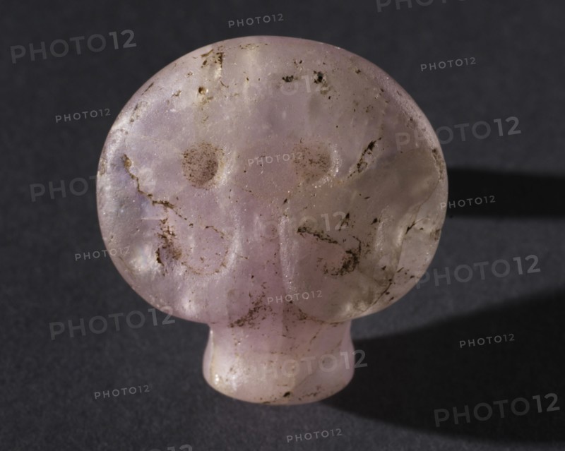 Bull's-Head Amulet, c. 3500 BC-2950 BC. Egypt, Predynastic Period, Naqada II-III Periods. Amethyst; overall: 3.4 x 3.7 x 2.6 cm (1 5/16 x 1 7/16 x 1 in.).