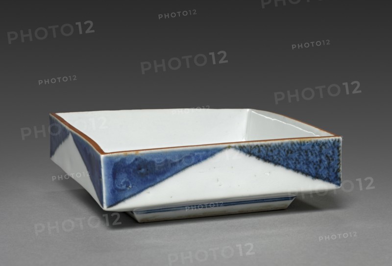 Square Dish with Rock and Tree Design: Arita Ware, 1700s. Japan, Edo period (1615-1868). Porcelain with underglaze blue and overglaze iron decoration; diameter: 11.8 cm (4 5/8 in.).