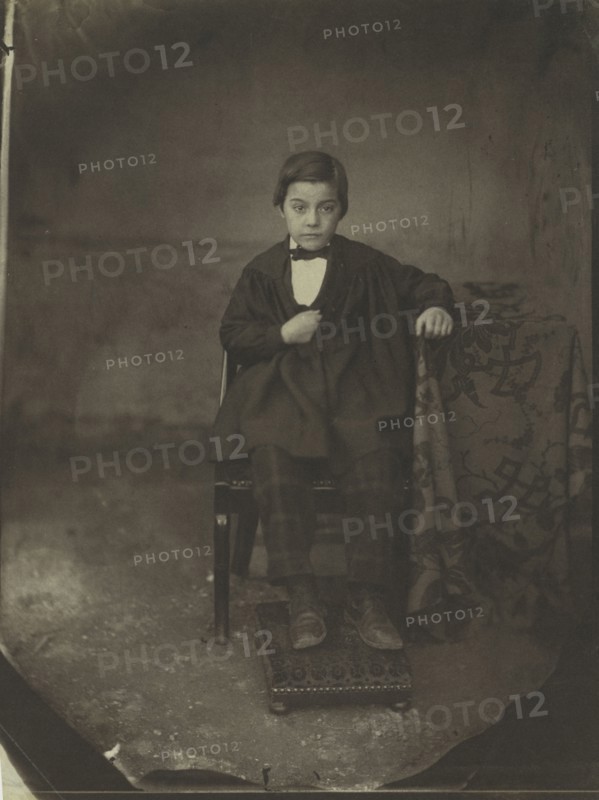 Portrait of a Young Boy, c. 1848. Louis-Adolphe Humbert de Molard (French, 1800-1874). Salted paper print from albumen on glass negative; image: 23.2 x 17.1 cm (9 1/8 x 6 3/4 in.); paper: 23.6 x 17.7 cm (9 5/16 x 6 15/16 in.); matted: 50.8 x 40.6 cm (20 x 16 in.)
