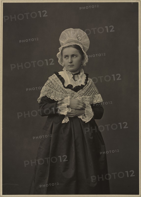 Woman in Lorraine Dress, c. 1860s-70s. Adolphe Braun (French, 1812-1877). Carbon print; paper: 40.8 x 29 cm (16 1/16 x 11 7/16 in.); matted: 66 x 55.9 cm (26 x 22 in.)