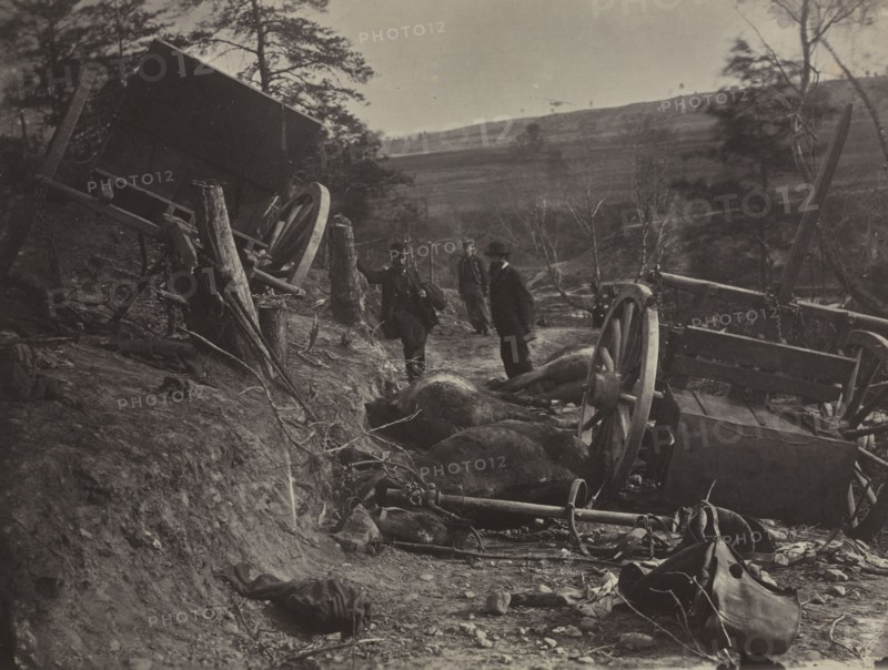 Effects of a Shell Explosion, Fredericksburg, VA., 1863. Andrew Joseph Russell (American, 1830-1902). Albumen print from wet collodion negative; image: 24.3 x 32.4 cm (9 9/16 x 12 3/4 in.); mounted: 35.5 x 43.7 cm (14 x 17 3/16 in.); matted: 50.8 x 61 cm (20 x 24 in.).