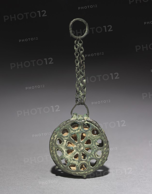 Phylactery (Reliquary Penant), c. 500-700. Byzantium, Egypt or Syria, early Byzantine period, 6th-8th centuries. Copper alloy; diameter: 3.2 cm (1 1/4 in.); overall: 7.8 cm (3 1/16 in.)