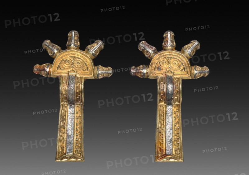Pair of Fibulae, 500s-600s. Alemannic, Migration Period, 6th-7th century. Cast silver, parcel-gilt, with niello; overall: 10.5 x 6.5 x 2 cm (4 1/8 x 2 9/16 x 13/16 in.)