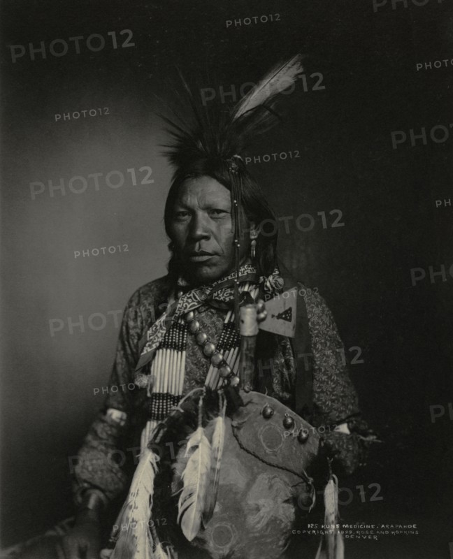 Runs Medicine, Arapahoe, 1898-1899. John K. Rose (American, 1849-1932), and Benjamin S. Hopkins (American, 1861-1915). Platinum print; image: 23.4 x 18.9 cm (9 3/16 x 7 7/16 in.); paper: 25.2 x 20.1 cm (9 15/16 x 7 15/16 in.); matted: 50.8 x 40.6 cm (20 x 16 in.)